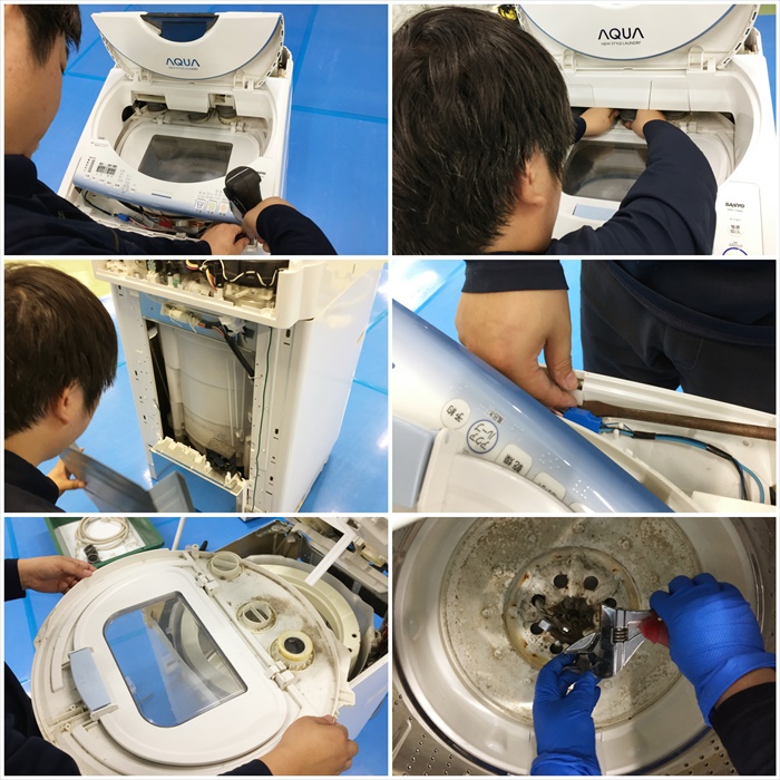 洗濯機を分解するスタッフ